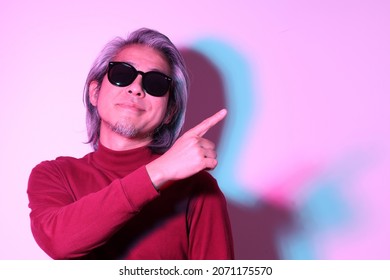 The Cool Senior Asian Man In The Gel Color Light Photography.