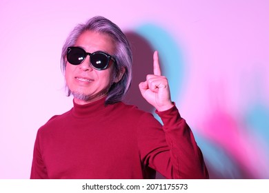 The Cool Senior Asian Man In The Gel Color Light Photography.