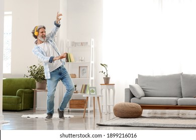 Cool Senior Man Dancing At Home