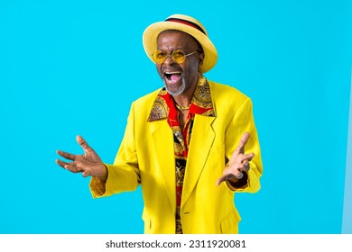 Cool senior man with fashionable clothing style portrait on colored background - Funny old male pensioner with eccentric style having fun - Powered by Shutterstock