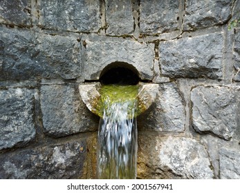  cool still picture of water coming out of and overflow pipe 