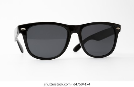 Cool sunglasses with black plastic frame isolated on white background