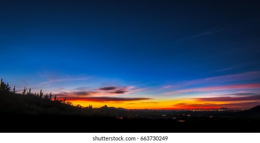 Cool Sunrise III - A Pre Dawn Image Of A Sonoran Desert Yields Cool Blue Tones.  A Panoramic Landscape Orientation.  The Image Includes Beautiful Jewel Tones. 