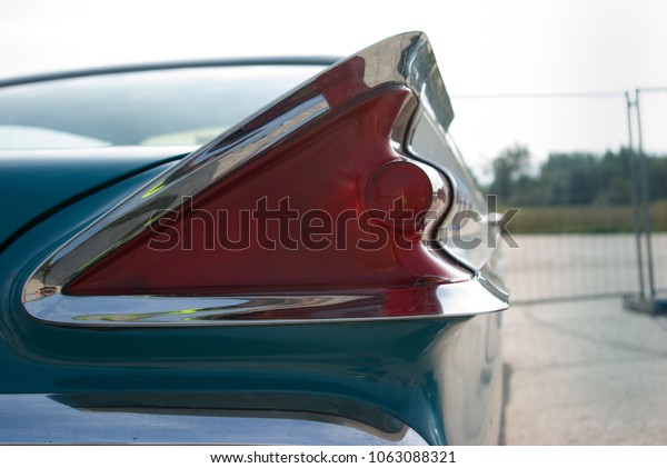 Cool vintage car\
detail. In the 1950\'s car design went really crazy and this photo\
is a good example of that.