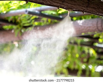 Cooling dry mist installed in the rest area - Shutterstock ID 2177798215