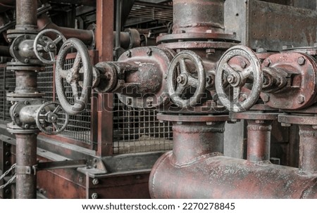 Cooling pipework of a historic machine.