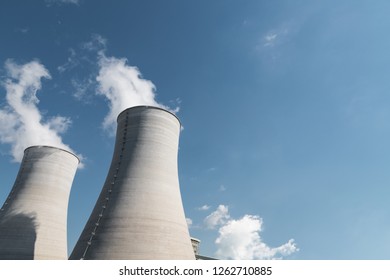 Cooling Tower Closeup, Power Plant And Blue Sky Background