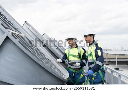 Cooling tower. Engineer or technicians maintenance and repair of cooling towers on rooftop of building