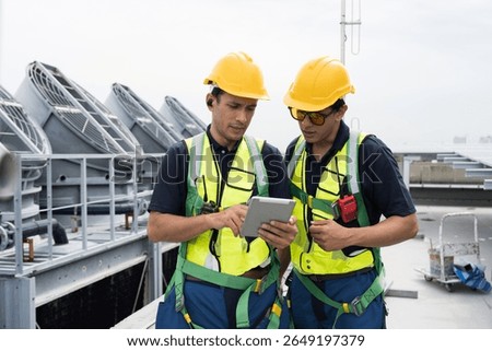 Cooling tower operations, Induced draft cooling towers service.
Team of engineer or technicians maintenance and repair of cooling towers for preventing issues Legionella growth on rooftop of building