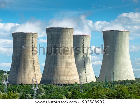 Cooling towers of nuclear power plant Mochovce with cloudy sky in the background. Nuclear power station.