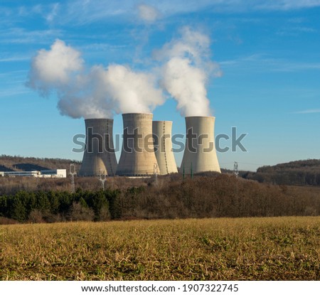 Cooling towers of nuclear power plant  with cloudy sky in the background. Nuclear power station.