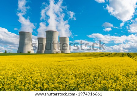 Cooling towers of a nuclear power plant in beautiful summer landscape. Nuclear power station Dukovany.