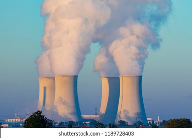 Cooling Towers With Water Steam In Morning Light, Nuclear Plant