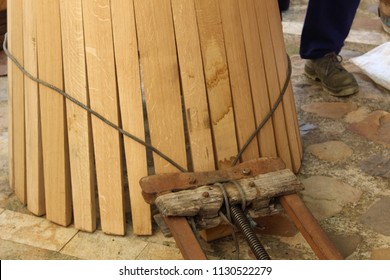 Cooper Making A Barrel By Hand