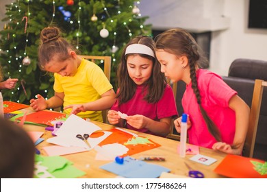 Cooperation And Support Between Kids At Christmas Workshop