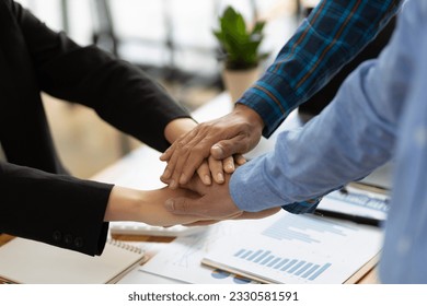 Cooperation and unity in the collaboration of people in the organization. Handshake of business partners at a meeting. - Powered by Shutterstock