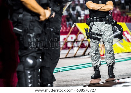 A cop with a weapon