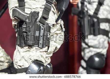 A cop with a weapon