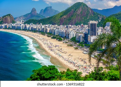 Copacabana beach in Rio de Janeiro, Brazil. Copacabana beach is the most famous beach of Rio de Janeiro, Brazil. Skyline of Rio de Janeiro.