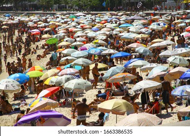 COPACABANA BEACH, RIO DE JANEIRO, BRAZIL- 9 February 2014. A view from Copacabana Beach which has a very vibrant and colorful atmosphere and always full of people. 
