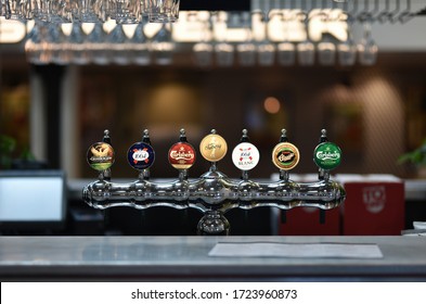 Copenhagen / Denmark - 07.26.19: Beer taps on pab bar. Trade marks Grimbergen, Kronenbourg, Carlsberg and Tuborg.