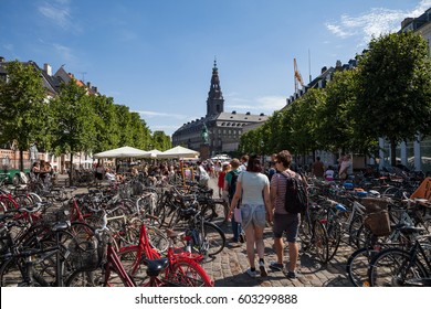 COPENHAGEN, DENMARK - 26 JUN 2016: Students Walking Through Huge Bike Parking