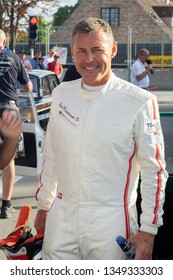 Copenhagen, Denmark - 4. August 2018: Le Mans Winner Tom Kristensen Walking In The Pit At Copenhagen Historic Grand Prix