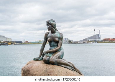 Copenhagen, Denmark, April 21, 2017: The Little Mermaid statue by Edvard Eriksen, displayed on a rock by the waterside at the Langelinie promenade in Copenhagen, Danmark.