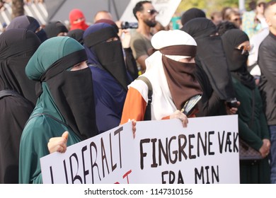 Copenhagen, Denmark - August 1, 2018: Muslim Women Protest At Demonstration Against Danish Legislation That Ban The Use Of Traditional Clothes Like Burqa And Niqab.