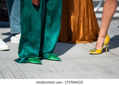 COPENHAGEN, DENMARK - AUGUST 11 2018: Street Style During Copenhagen Fashion Week Spring Summer 2019. Outfit: Green Silk Pants And Green Shoes