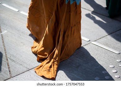 COPENHAGEN, DENMARK - AUGUST 11 2018: Street Style During Copenhagen Fashion Week Spring Summer 2019. Outfit: Long Brown Silk Maxi Skirt.