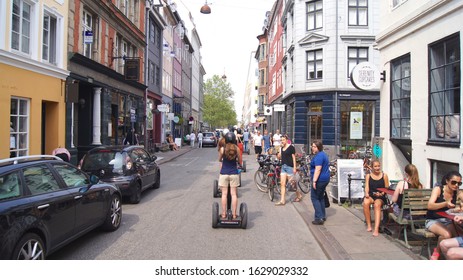 COPENHAGEN, DENMARK - JUL 06th, 2015: Tourists Enjoy Sightseeing Of Copenhagen During Their Guided Segway Tour