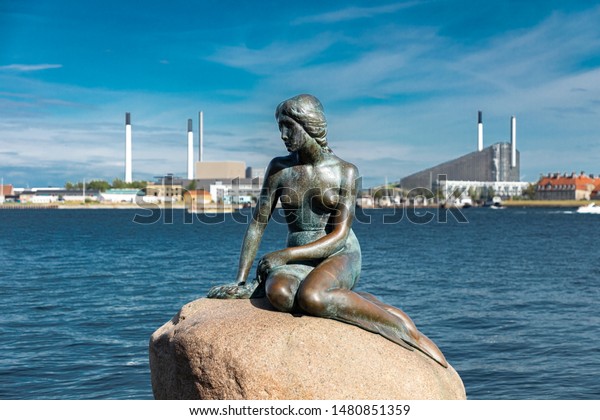 COPENHAGEN / DENMARK -\
JULY 09, 2019: The little mermaid statue on Langelinie promenade in\
Copenhagen, Denmark