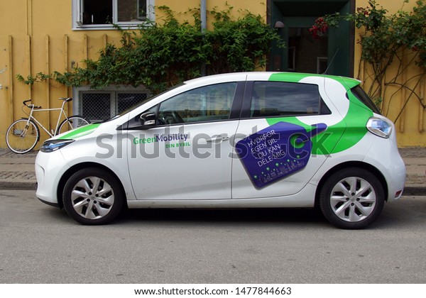 Copenhagen,\
Denmark - July 20, 2019: Green Mobility Renault Zoe parked by the\
side of the road. Nobody in the\
vehicle.