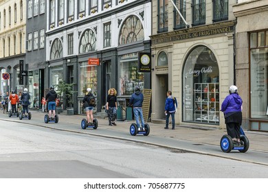 Copenhagen, Denmark - July 24, 2017: Tourist Group Having Guided Segway City Tour In Copenhagen, Denmark.