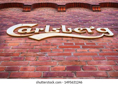 Copenhagen. Denmark. July 25, 2019. Carlsberg Brewery logo on a brick wall. Bottom View Attractions Travels