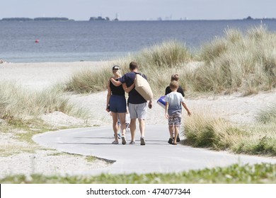 COPENHAGEN, DENMARK - July 28, 2016: Kids, Families, Couples, Men And Women Are Taking A Sunbath Or Swimming Enjoying A Sunny Summer Day At Bellevue Beach In Hellerup, A Suburb Of Copenhagen.