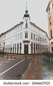 COPENHAGEN, DENMARK - March 11th, 2018: Architecture and buildings in the famous shopping street of Stroget in Copenhagen featuring the typical Scandinavian style