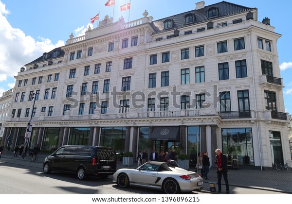 COPENHAGEN, DENMARK - may 12, 2019: View of\
Hotel D\'Angleterre building (1795) in Copenhagen. Hotel\
d\'Angleterre is one of the first deluxe hotels in the world,\
situated in the heart of\
Copenhagen.