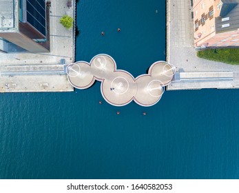 Copenhagen, Denmark - May 27, 2019: Aerial Drone View Of The Modern Circle Bridge, A Pedestrian Bridge In The Harbour Area.