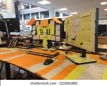 Copenhagen / Denmark - November 29 2017: Landscape Picture Of A Work Desk Covered In Post It Notes As A Prank