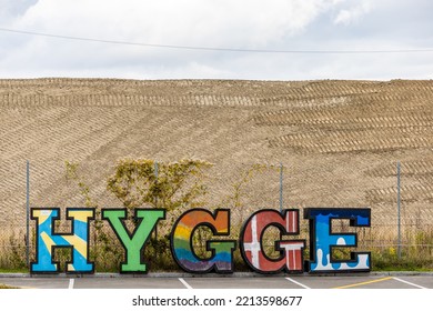 Copenhagen, Denmark Oct 13, 2022 A Colorful Sign Says Hygge In Danish, Or Cozy.in A Parking Lot.