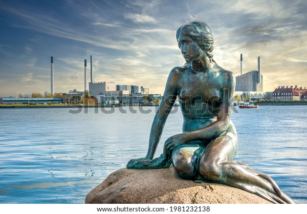 Copenhagen, Denmark – Oct 19, 2018: The Little\
Mermaid bronze sculpture and iconic landmark near Langelinie\
Street. By Edvard Eriksen, of a character from Hans Christian\
Andersen’s\
fairytale.