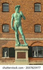 Copenhagen, Denmark. September 27, 2019: Replica of Michelangelo's statue of David outside the Alamy building.