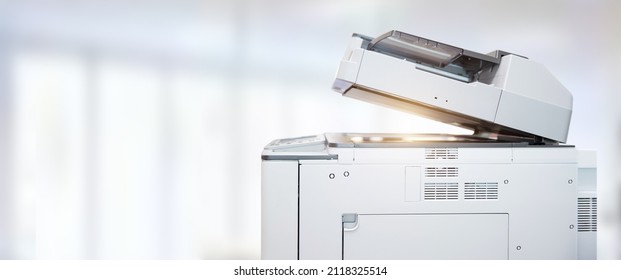 Copier printer, Close up the photocopier or photocopy machine office equipment workplace for scanner or scanning document and printing or copy paper duplicate and Xerox. - Shutterstock ID 2118325514