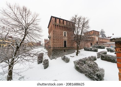 A copious snowfall whitens the streets and monuments of the village of Galliate in the province of Novara - Shutterstock ID 2081688625