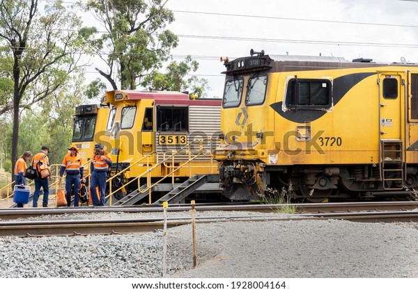 Coppabella, Queensland, Australia\
- 02.26.2021; Change of train engine crews at the coal train depot\
in Coppabella, Queensland, Australia with three trains\
standing.