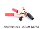 Copper battery terminals isolated on a white background. Car battery electrical clamps black and red. Electrical connectors.