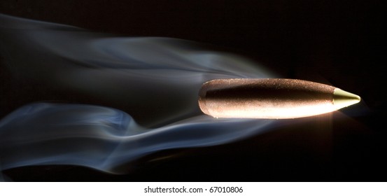 copper bullets that is going so fast it is trailing smoke