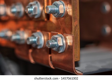 Copper Busbar. Nuts And Bolts Close-up.